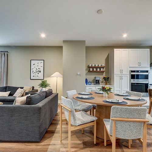 An open floor plan that seamlessly connects the dining and kitchen areas.