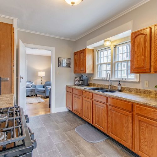 A fully equipped kitchen featuring modern countertops and appliances, perfect for cooking and baking. Ample cookware, utensils, and supplies ensure you’ll have everything you need, plus child-friendly dining ware to make mealtime easy for everyone!