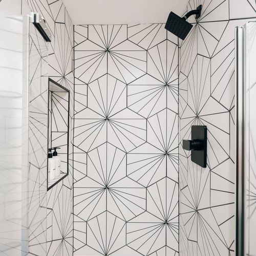 Bathroom 2 has walk-in glass shower