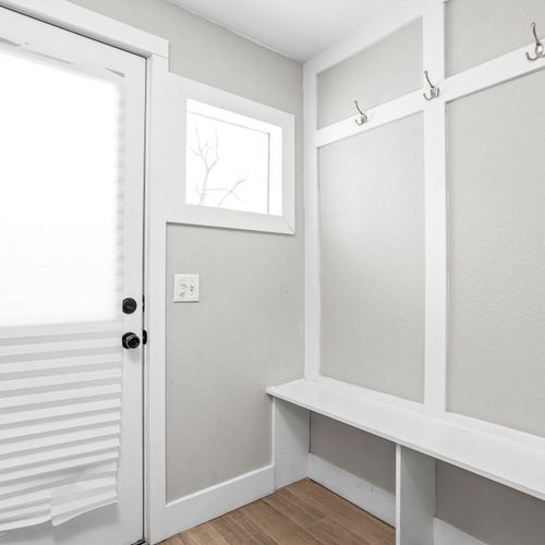 Our mudroom just off of the kitchen leading into the backyard.