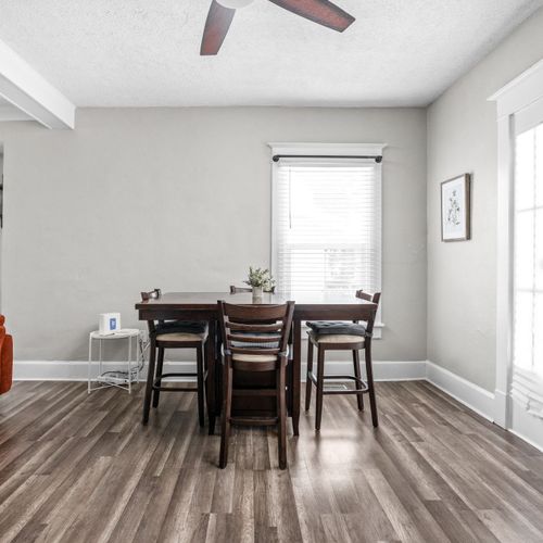 Experience modern comfort in this dining nook adjacent to the living area.