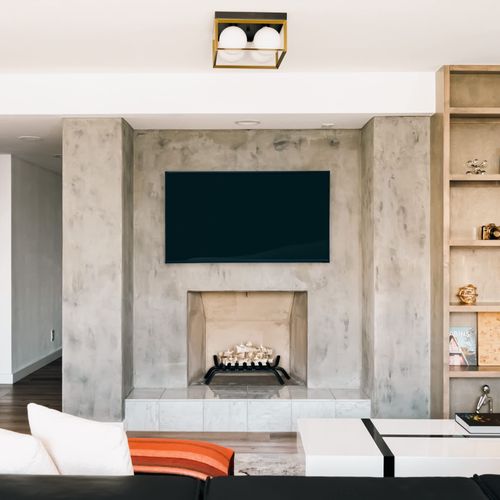 Living area has a 70 inch Smart TV *Fireplace is non-operational and not available for guest use*