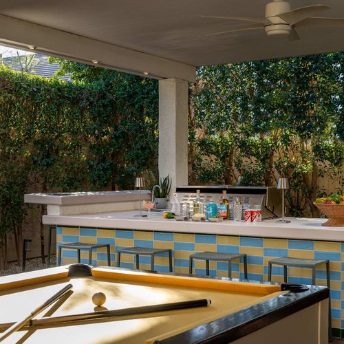 Billiards table and outdoor grilling area