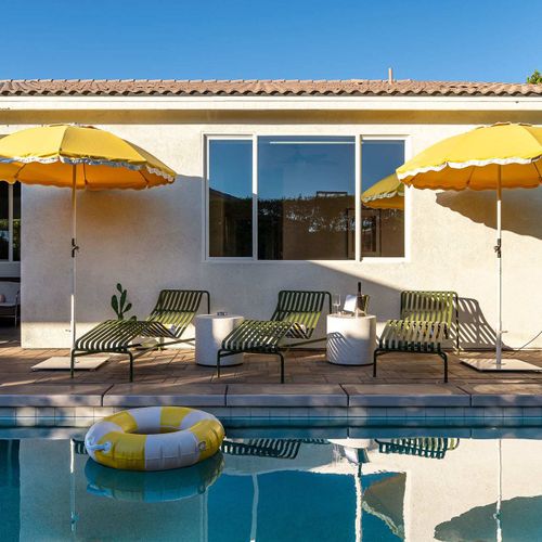 Pool and hot tub with sun loungers