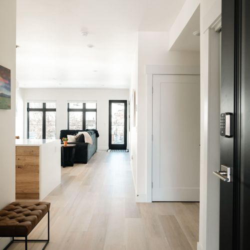 Entry with kitchen and living area