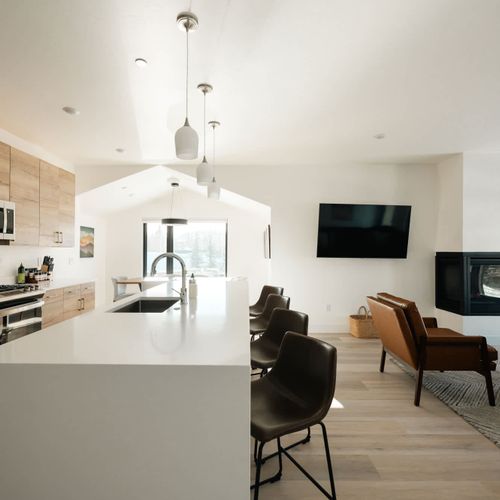 Kitchen, dining, and living areas