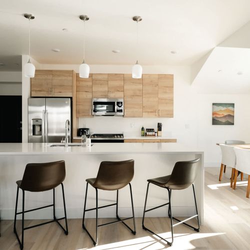 Kitchen with island seating and dining area