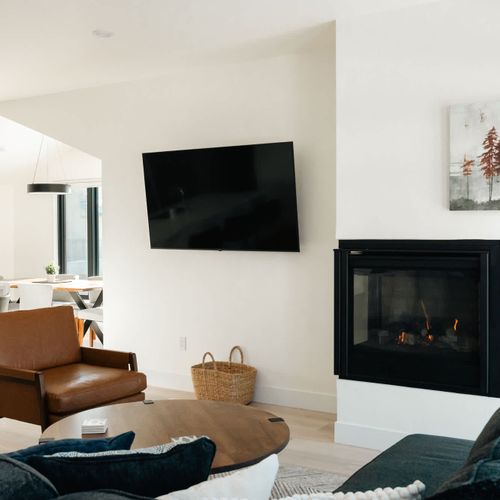 Main living area with smart TV and gas fireplace