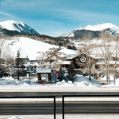 Living area balcony view of Buffalo Mountain and 'Big Red Mountain' + Super Target across the highway