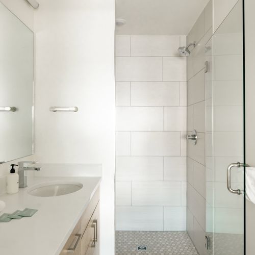 Primary bathroom with a walk-in glass shower