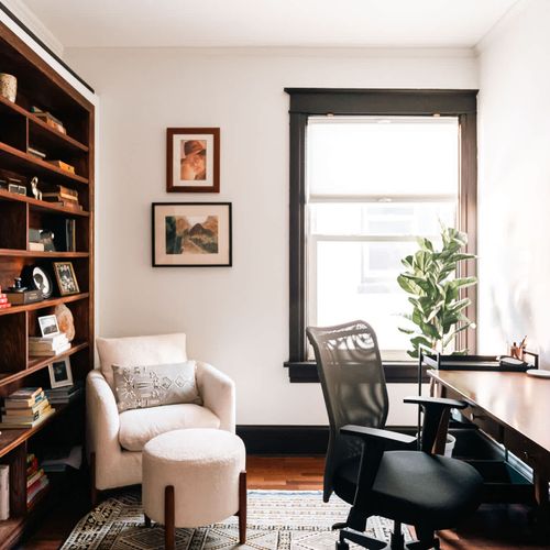 Study has a desk, chair, and monitor for your use