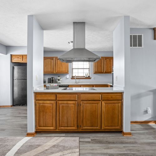 A view into our kitchen, with modern appliances and ample space for cooking!