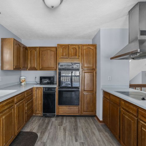 Our kitchen, with all of the cooking basics and supplies to start a family meal!