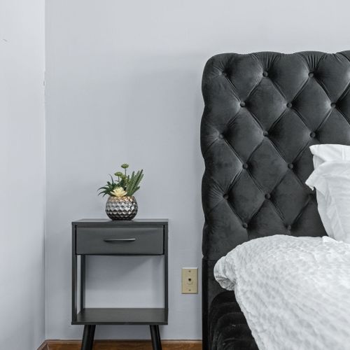 A thoughtful nightstand to ensure ample space for your extra items!