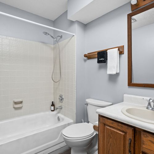 Another full bathroom is featured in the downstairs area, complete with Shampoo, Conditioner, Body Wash, and makeup towels!