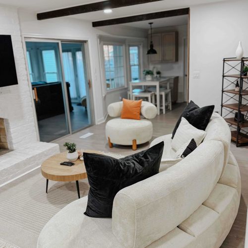 Stylish comfort meets modern elegance! Relax in this beautifully designed living space with plush seating, chic decor, and a cozy ambiance—perfect for unwinding or entertaining.