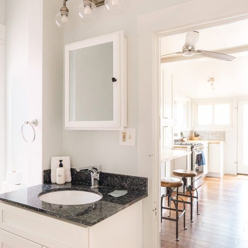Main level bathroom opens into the kitchen