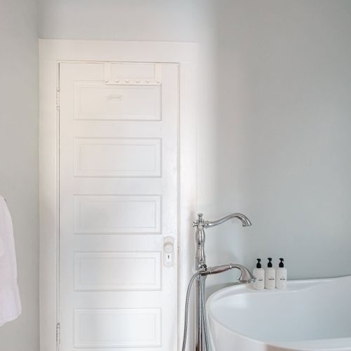 Main level bathroom has 2nd entry into bedroom 2