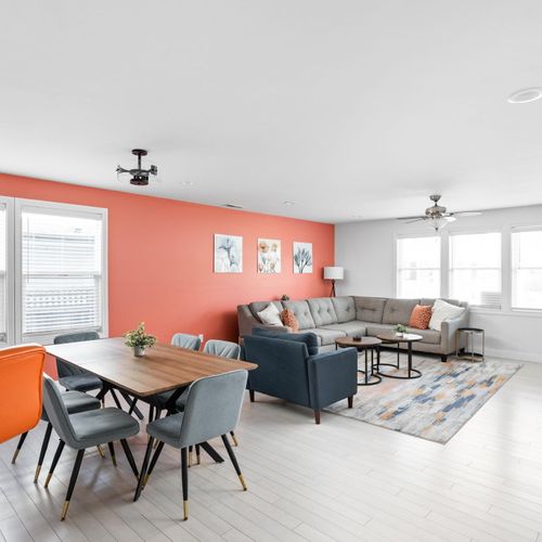 Dining Area: This area seamlessly connects the living area and kitchen, creating an atmosphere for socializing with the entire group!