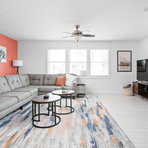 Living Room: Bright and modern, comfy and inviting! Ready for your next Indy stay!