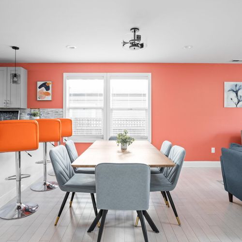 Dining Area: This area seamlessly connects the living area and kitchen, creating an atmosphere for socializing with the entire group!