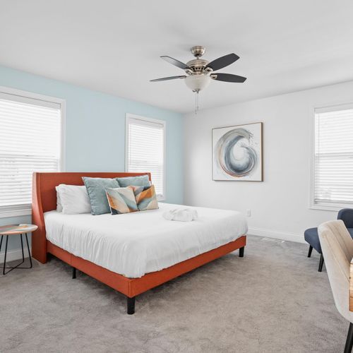 Primary Bedroom: This room features our Blue Jewel theme and embraces Indianapolis' vibrant aesthetic!
