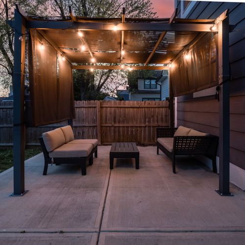 Backyard: Spacious fenced yard perfect for playful pups and sunny afternoon BBQs! We offer outdoor seating, a fun outdoor ring toss game, and a grill for your convenience!