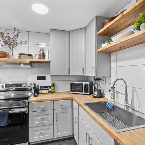 Fully equipped kitchen with stainless steel appliances