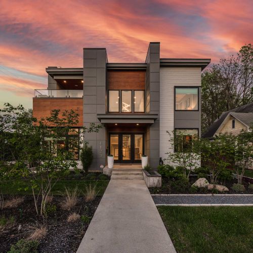 Welcome to your ultimate retreat in the heart of Fountain Square, Indy's vibrant cultural district. This luxury custom-built 5-bedroom haven features an upstairs deck with a city view.