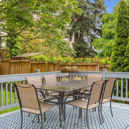 The beautiful backyard, with outdoor dining area
