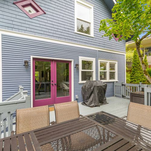 The beautiful backyard, with outdoor dining area