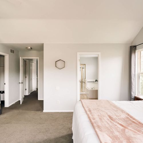 Primary bedroom has a walk-in closet and en suite bathroom