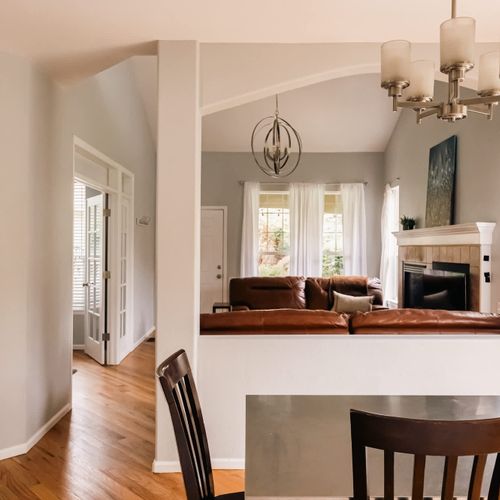 Looking from the dining area into the living area