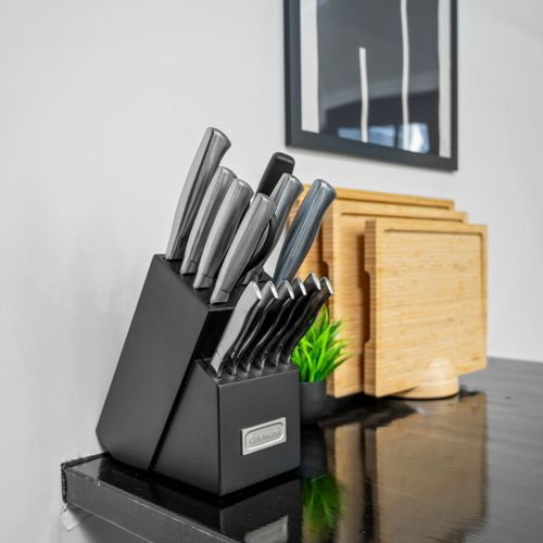 Sharp Cuisinart knives paired with three handy cutting boards—kitchen essentials done right.