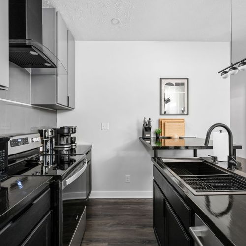 Step inside and cook up a meal! All the essentials are here—plus an upgraded dishwasher for easy cleanup.