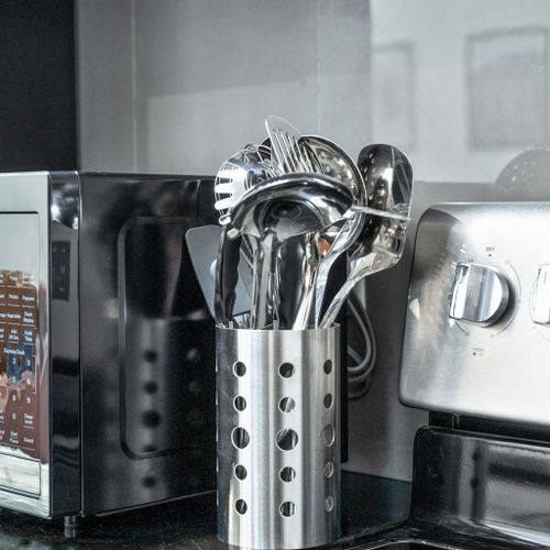 Stainless steel utensils adding a touch of modern style.