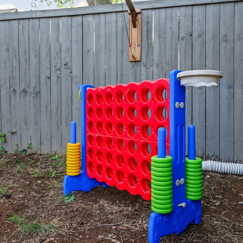 Giant Connect Four and Ring Toss are ready to play — pardon us, our grass is still working on its glow-up!