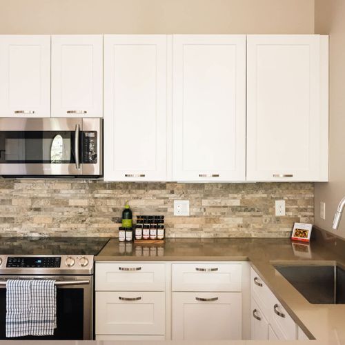 Large kitchen with stainless steel appliances