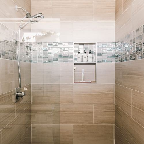 Walk-in glass shower in the primary bathroom