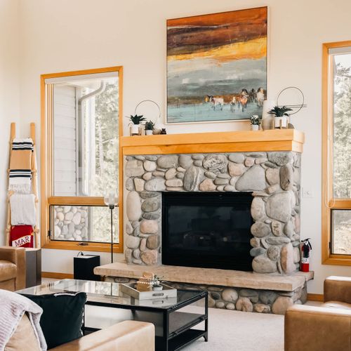 Main level living area with smart TV and gas fireplace