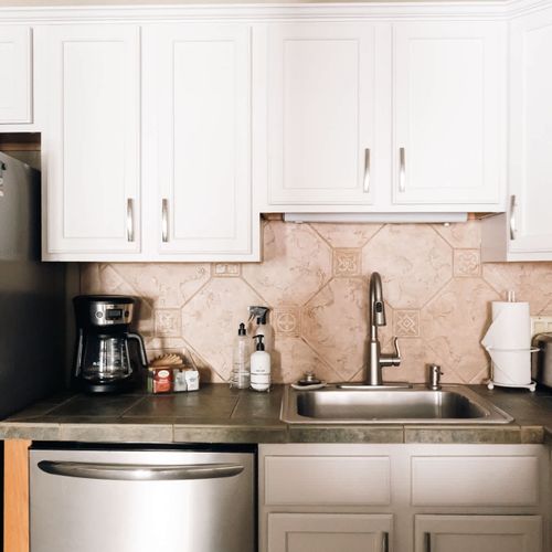 Stainless steel appliances are featured throughout