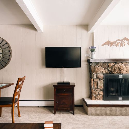 Living area with TV and fireplace