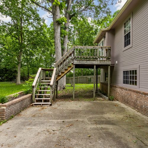 Our backyard features a balcony just off of our kitchen!