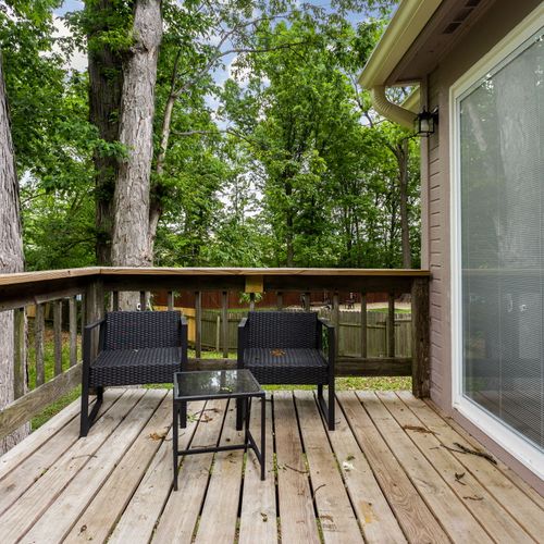 Just off the kitchen, our balcony with seating to enjoy our backyard views!
