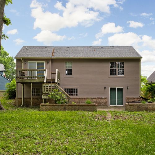Backyard views: We have an entrance to the backyard off of the lower level living area, perfect for relaxing and enjoying the summer vibes!