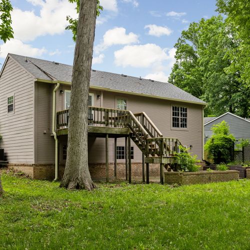 Backyard views: We have an entrance to the backyard off of the lower level living area, perfect for relaxing and enjoying the summer vibes!