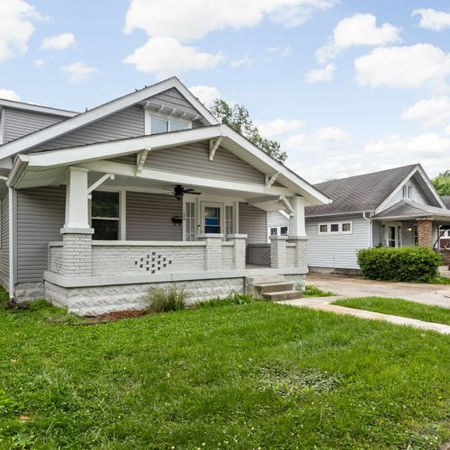 Our charming updated bungalow with a cozy front porch, driveway, and classic Indy curb appeal — perfect for your next stay in the heart of the city!