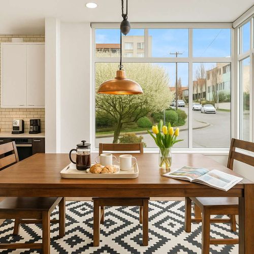 Open layout flows from kitchen to dining. Great for meals or informal gatherings.