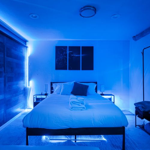 Basement sleeping area with queen bed