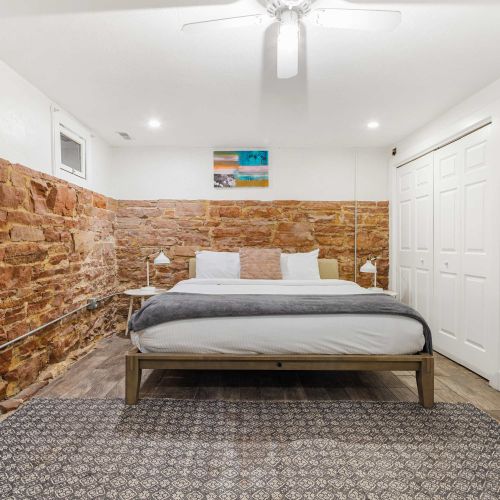 Bedroom 4 in basement with king bed